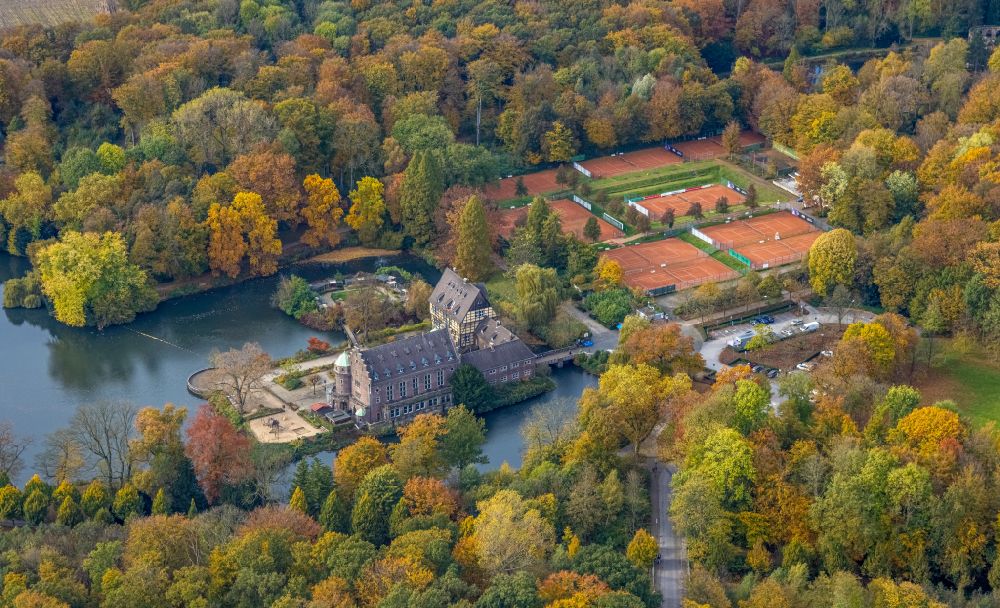 Gladbeck from the bird's eye view: Autumnal vegetation view of moated castle Schloss Wittringen with castle park and ponds in Gladbeck in the Ruhr area in the state of North Rhine-Westphalia - NRW, Germany