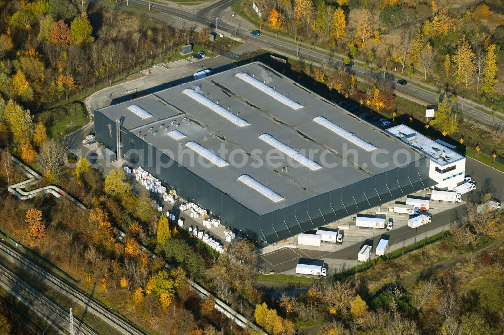Berlin from the bird's eye view: Autumnal discolored vegetation view buildings and production halls on the factory premises of the large laundry of Greif Textile Mietsysteme on Berlin Pablo-Picasso-Strass in the district Neu-Hohenschoenhausen in Berlin, Germany