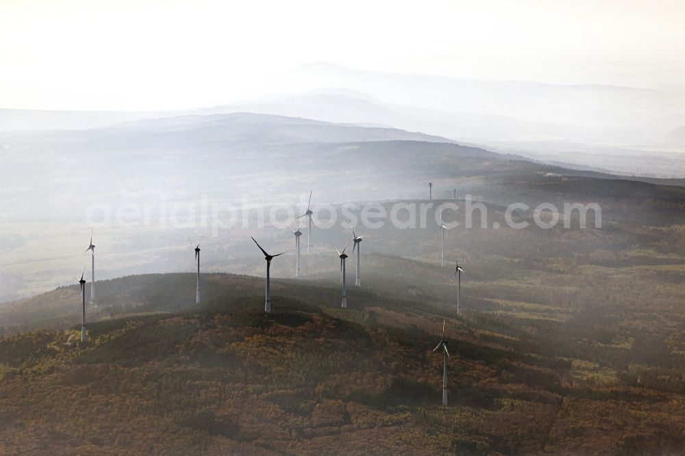 Daxweiler from above - Autumnal discolored vegetation view weather-induced wind energy installations embedded in a fog layer in Oberheimbach in the state Rhineland-Palatinate, Germany