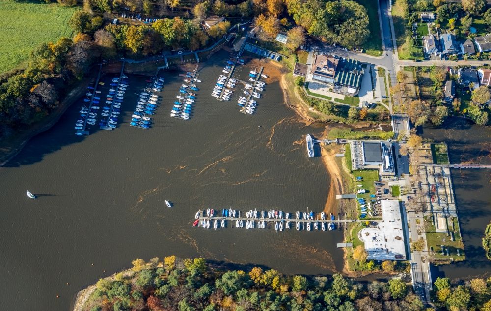 Aerial photograph Haltern am See - Autumnal discolored vegetation view pleasure boat marina with docks and moorings on the shore area Muehlenbach in Haltern am See in the state North Rhine-Westphalia, Germany