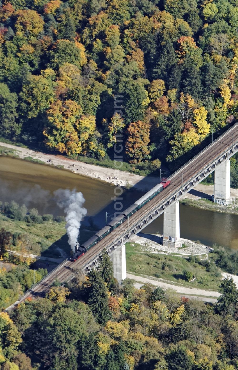Pullach im Isartal from the bird's eye view: Ancient electric train and steam train on the Grosshesseloher Bruecke in Pullach im Isartal in the state Bavaria