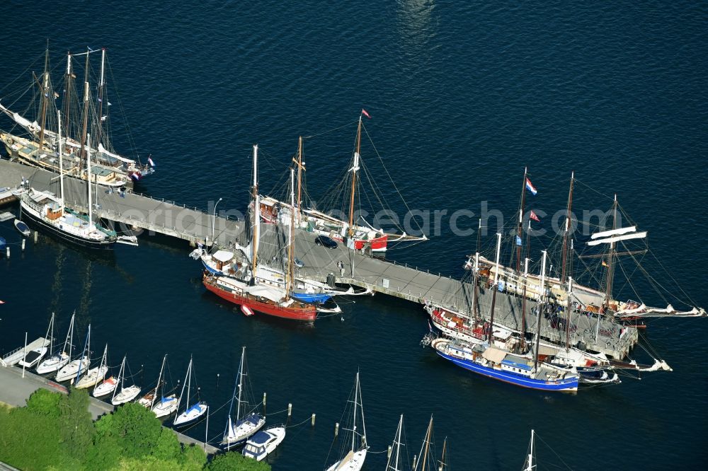 Aerial image Kiel - Historical sailing ships of the Dutch shipping company TSC GROUP, TSC-Traditional Sailing charter BV and Zeilvloot Harlingen in the harbour in Kiel in the federal state Schleswig - Holstein, Germany