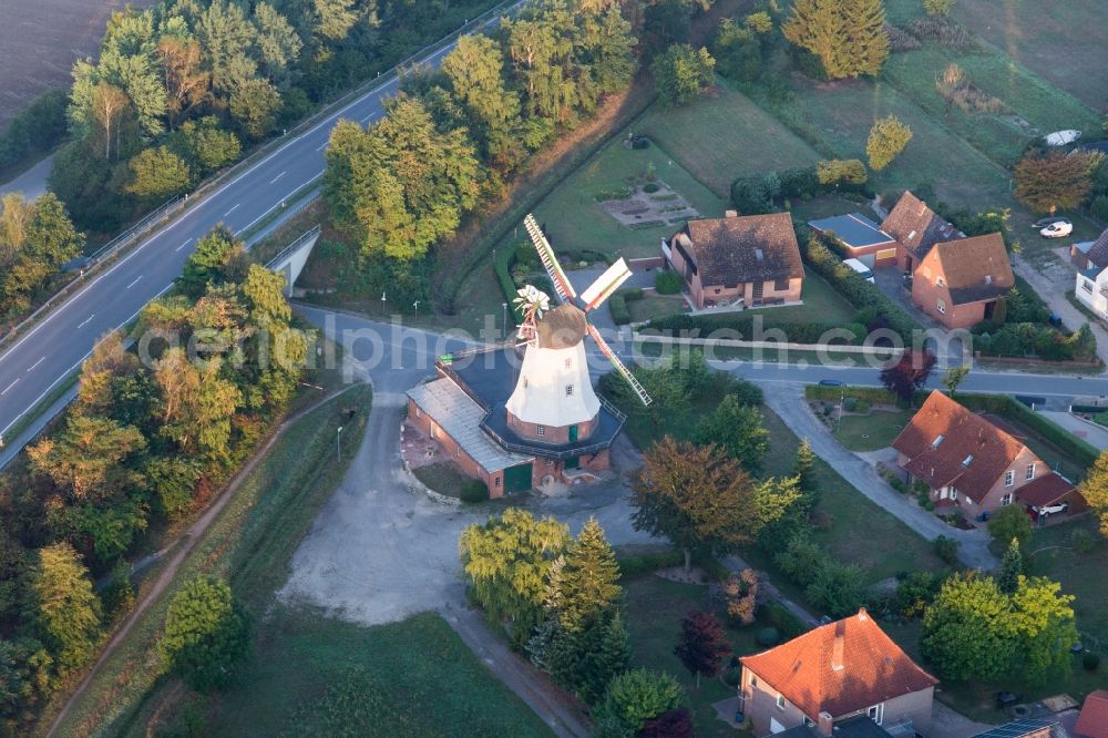 Artlenburg from above - Historic windmill on a farm homestead on the edge of cultivated fields in Artlenburg in the state Lower Saxony, Germany