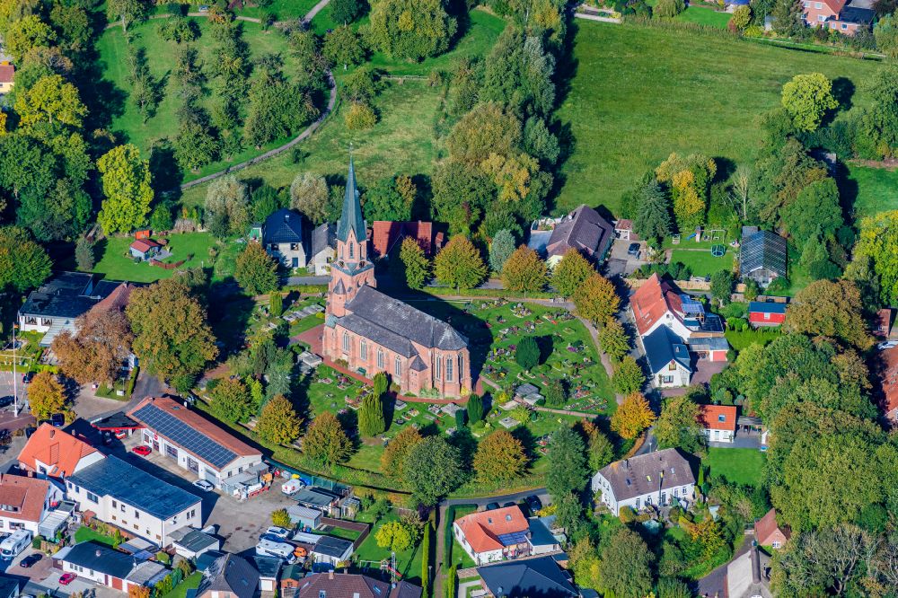 Aerial photograph Butjadingen - Historic church complex St. Petri Kirche in Butjadingen in the state Lower Saxony, Germany