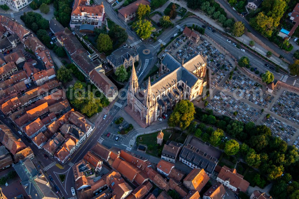 Aerial image Obernai - Historic church complex Eglise Saints-Pierre-et-Paul on street Rempart Monseigneur Freppel in Obernai in Grand Est, France
