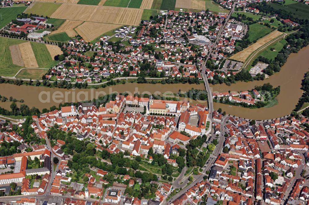 Neuburg an der Donau from the bird's eye view: Historic old town of Neuburg an der Donau in the state of Bavaria. The large city castle dates back to a medieval castle and now houses the Schlossmuseum. In the center town parish church of St. Peter and Hofkirche and the town hall