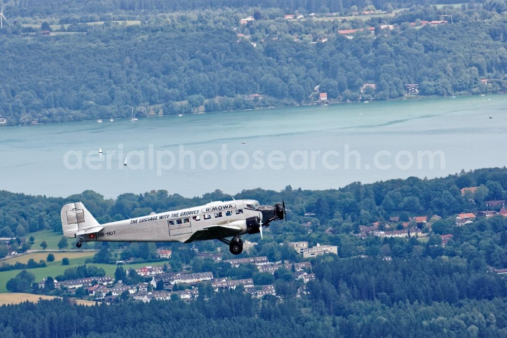 Aerial photograph Starnberg - Historic aircraft Junkers Ju 52 on the fly over the airspace near Starnberg in the state Bavaria, Germany