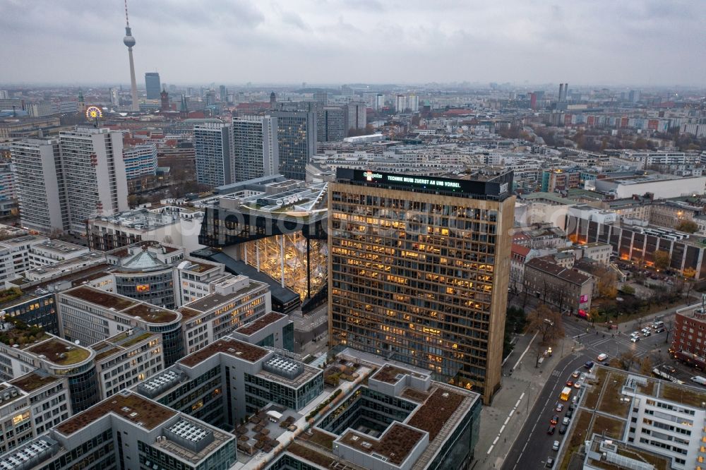 Berlin from the bird's eye view: Office and corporate management high-rise building of Axel-Springer Verlages on street Rudi- Dutschke- Strasse - Axel- Springer- Strasse in the district Kreuzberg in Berlin, Germany