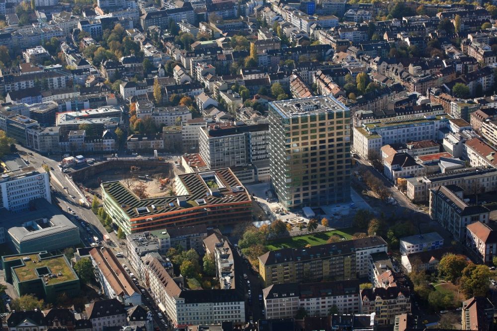 Basel from above - High-rise building and Biocenter of the university Basle in Basle in Switzerland. Also seen the children Hospital and the construction works of the ETH Zuerich department of biosystems science and Engineering D-BSSE in the Life Science Campus