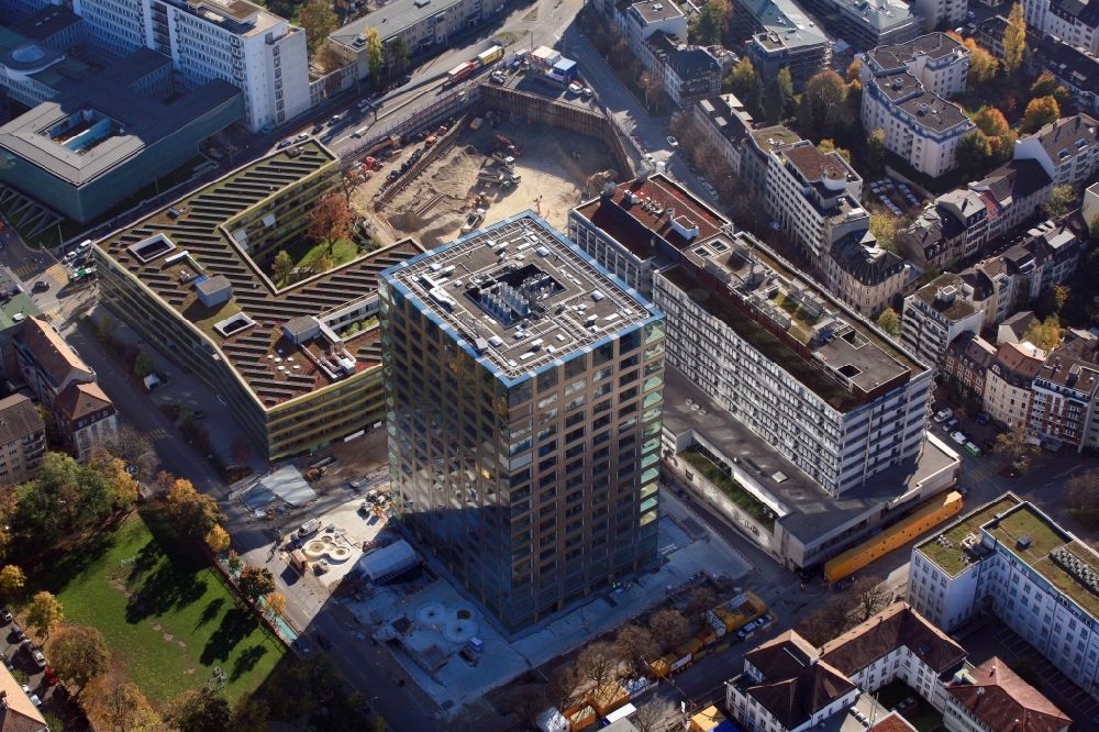Basel from the bird's eye view: High-rise building and Biocenter of the university Basle in Basle in Switzerland. Also seen the children Hospital and the construction works of the ETH Zuerich department of biosystems science and Engineering D-BSSE in the Life Science Campus