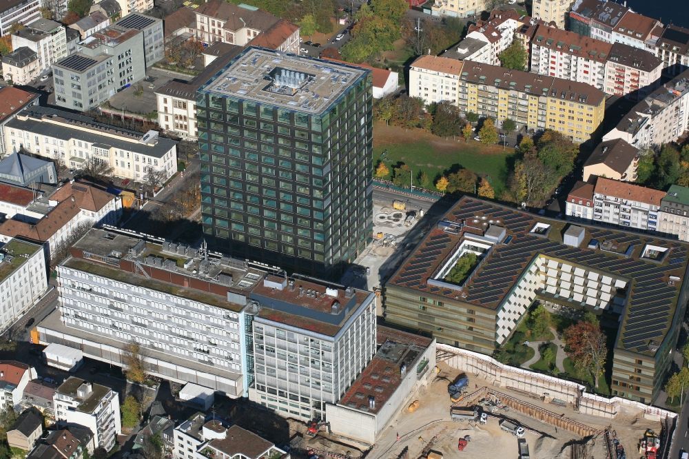 Aerial photograph Basel - High-rise building and Biocenter of the university Basle in Basle in Switzerland. Also seen the children Hospital and the construction works of the ETH Zuerich department of biosystems science and Engineering D-BSSE in the Life Science Campus