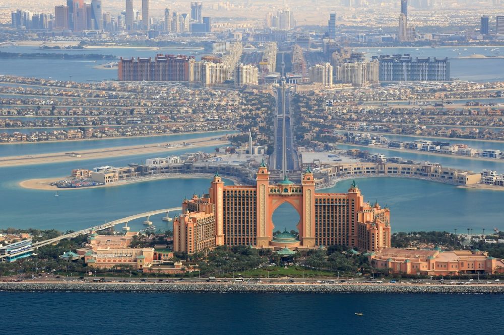 Dubai from above - High-rise building of the hotel complex Atlantis, The Palm Crescent Rd in the district The Palm Jumeirah in Dubai in United Arab Emirates