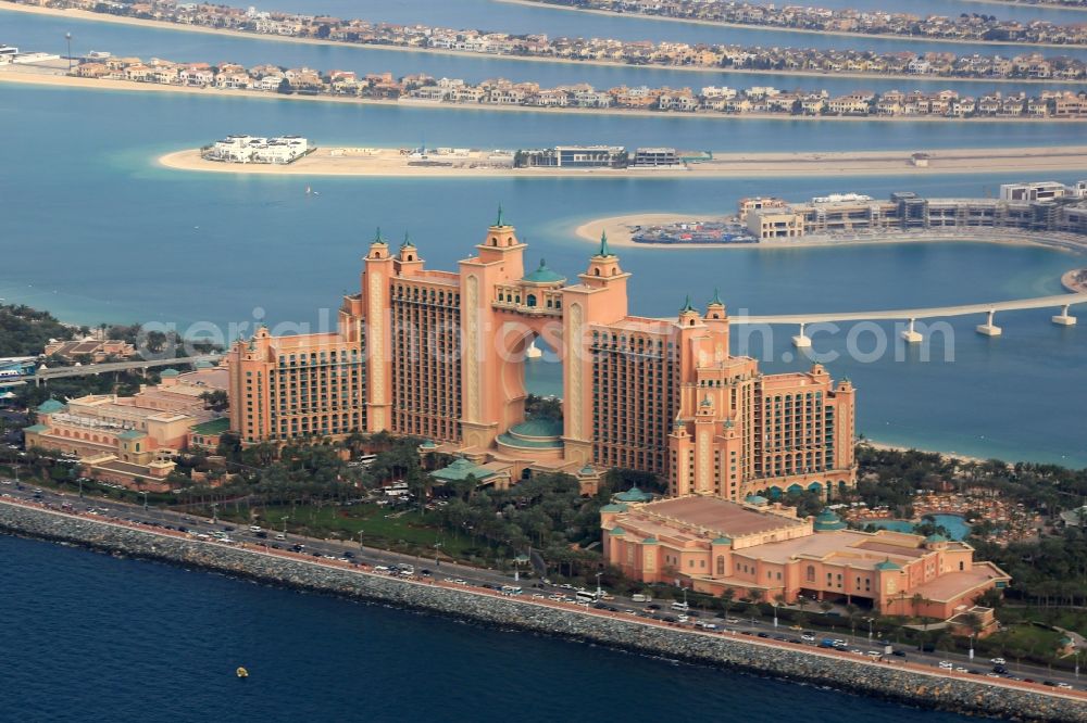 Dubai from above - High-rise building of the hotel complex Atlantis, The Palm Crescent Rd in the district The Palm Jumeirah in Dubai in United Arab Emirates