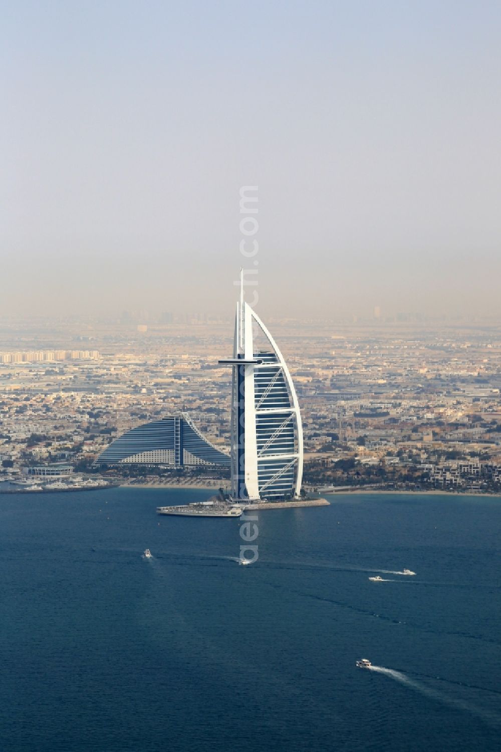 Aerial photograph Dubai - High-rise building of the hotel complex Burj Al Arab Jumeirah in the coastal area of the Persian Gulf in the district Umm Suqeim in Dubai in United Arab Emirates