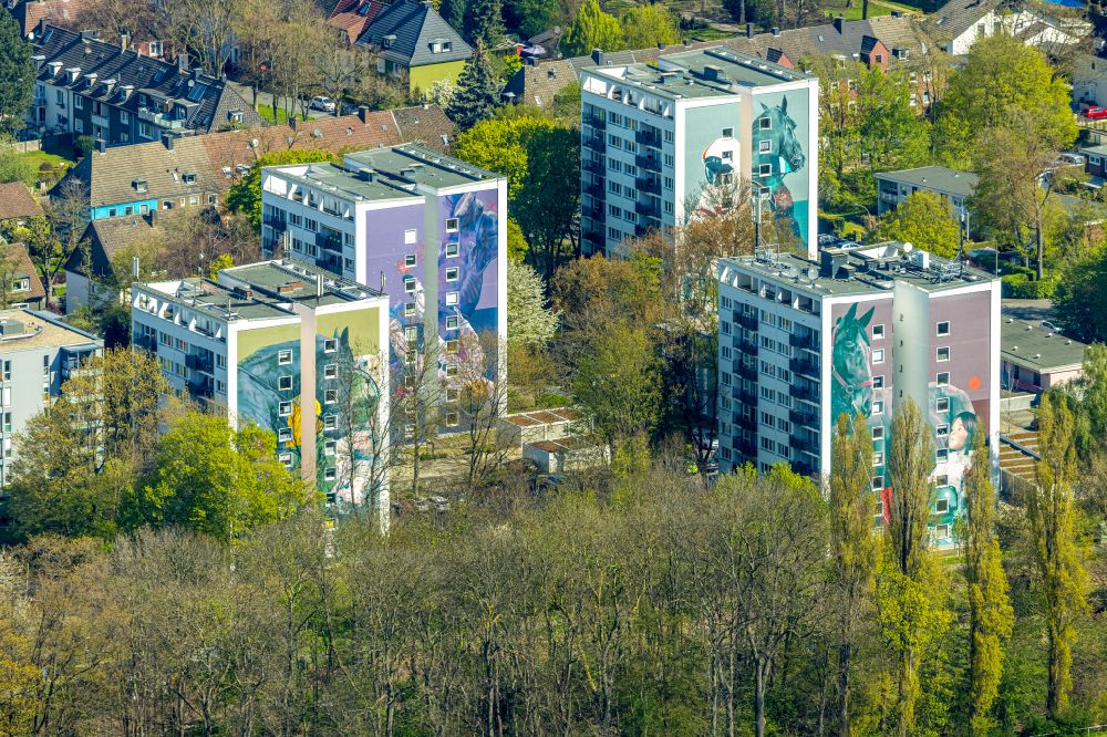 Dortmund from the bird's eye view: High-rise building in the residential area with colorful horse motifs as facade cladding on street Espenstrasse in Dortmund at Ruhrgebiet in the state North Rhine-Westphalia, Germany