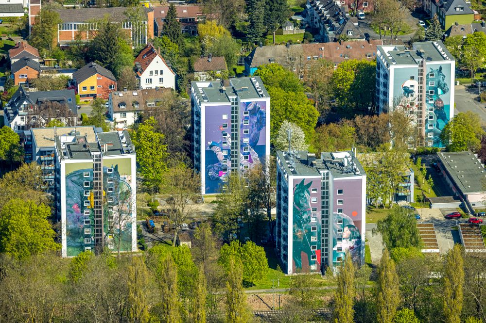 Aerial photograph Dortmund - High-rise building in the residential area with colorful horse motifs as facade cladding on street Espenstrasse in Dortmund at Ruhrgebiet in the state North Rhine-Westphalia, Germany