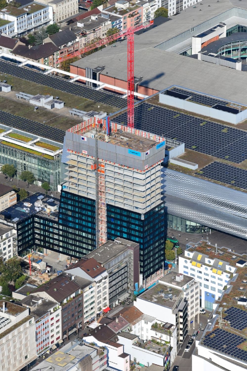 Basel from above - High-rise construction site for a new residential and commercial building Claraturm in the district Clara in Basel, Switzerland