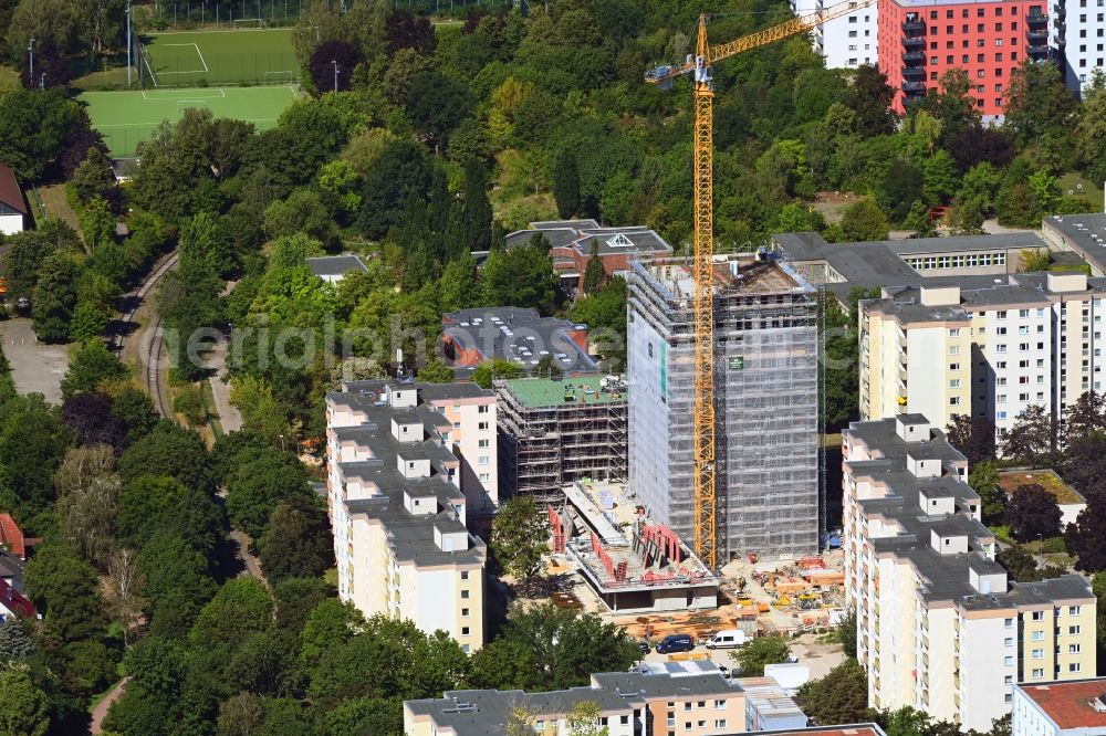 Aerial photograph Berlin - High-rise construction site for a new residential and commercial building Theodor-Loos-Weg corner Wutzkyallee in the district Buckow in Berlin, Germany