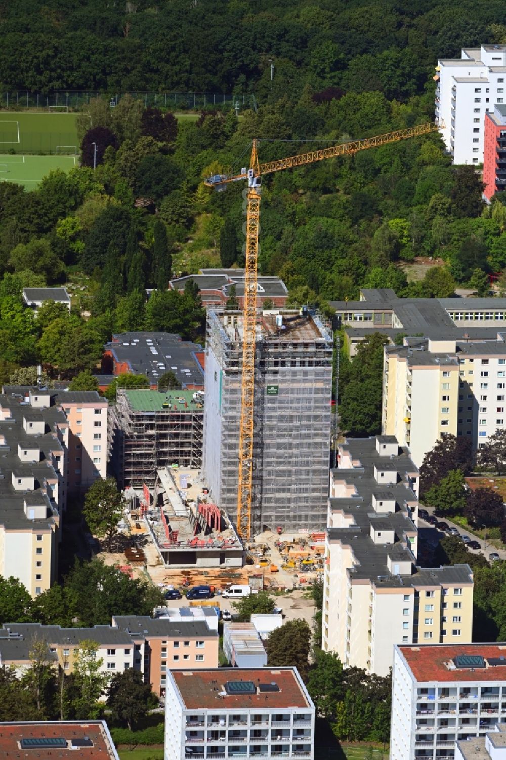 Aerial image Berlin - High-rise construction site for a new residential and commercial building Theodor-Loos-Weg corner Wutzkyallee in the district Buckow in Berlin, Germany