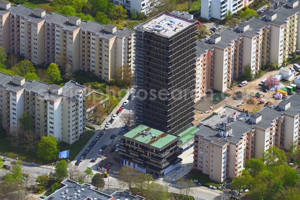 Berlin from the bird's eye view: High-rise construction site for a new residential and commercial building Theodor-Loos-Weg corner Wutzkyallee in the district Buckow in Berlin, Germany