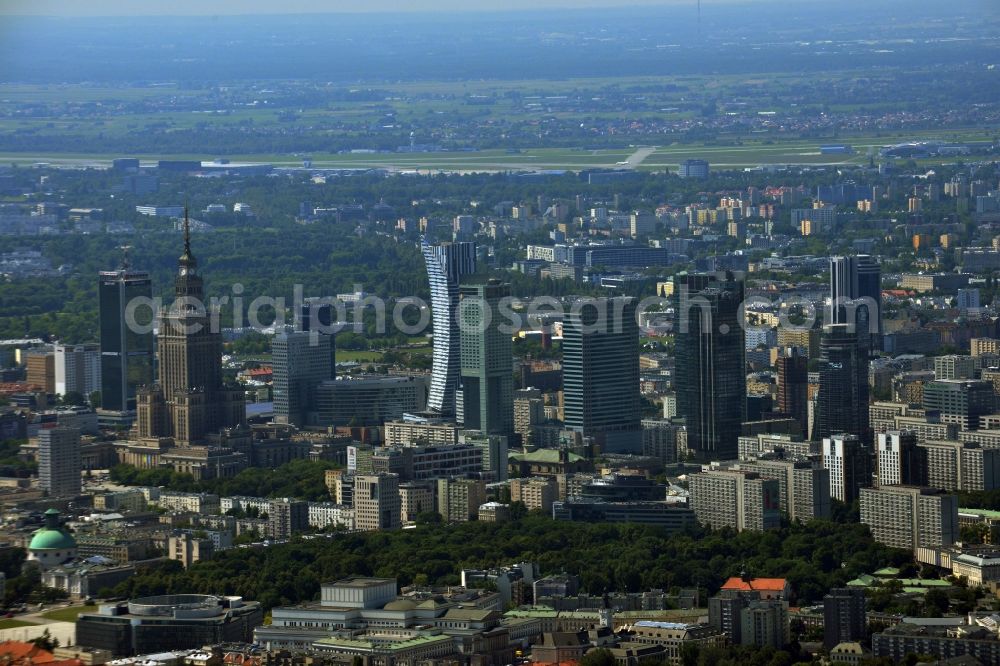 Aerial photograph Warschau - Skyscraper skyline in the city center of Warsaw in Poland. The series of buildings ranging from the landmark high-rise buildings of the Palace of Culture and Science, the Zlota 44, Blue Tower Plaza; Hotel Inter-Continental; Warsaw Financial Center; Rondo 1-B; Oxford Tower and other