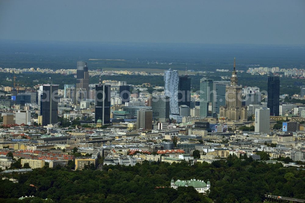 Aerial image Warschau - Skyscraper skyline in the city center of Warsaw in Poland. The series of buildings ranging from the landmark high-rise buildings of the Palace of Culture and Science, the Zlota 44, Blue Tower Plaza; Hotel Inter-Continental; Warsaw Financial Center; Rondo 1-B; Oxford Tower and other