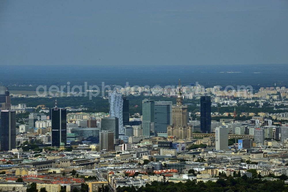 Warschau from above - Skyscraper skyline in the city center of Warsaw in Poland. The series of buildings ranging from the landmark high-rise buildings of the Palace of Culture and Science, the Zlota 44, Blue Tower Plaza; Hotel Inter-Continental; Warsaw Financial Center; Rondo 1-B; Oxford Tower and other