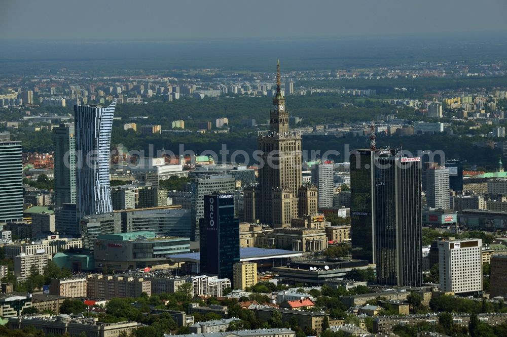 Aerial image Warschau - Skyscraper skyline in the city center of Warsaw in Poland. The series of buildings ranging from the landmark high-rise buildings of the Palace of Culture and Science, the Zlota 44, Blue Tower Plaza; Hotel Inter-Continental; Warsaw Financial Center; Rondo 1-B; Oxford Tower and other