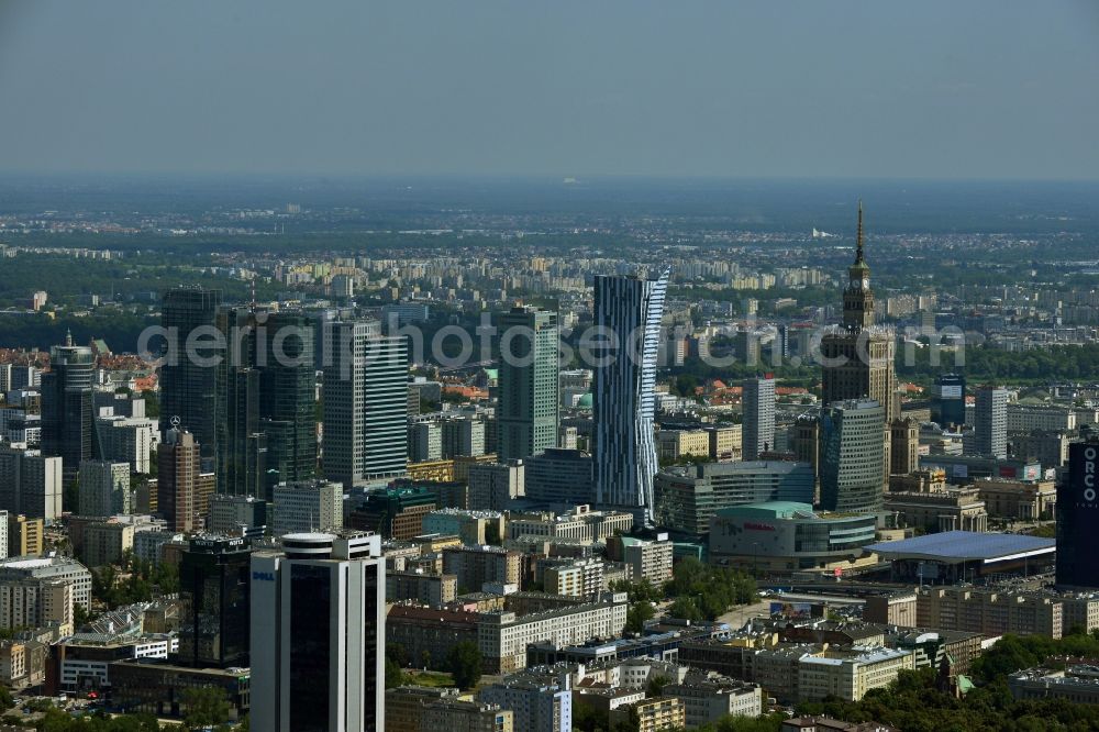 Warschau from above - Skyscraper skyline in the city center of Warsaw in Poland. The series of buildings ranging from the landmark high-rise buildings of the Palace of Culture and Science, the Zlota 44, Blue Tower Plaza; Hotel Inter-Continental; Warsaw Financial Center; Rondo 1-B; Oxford Tower and other