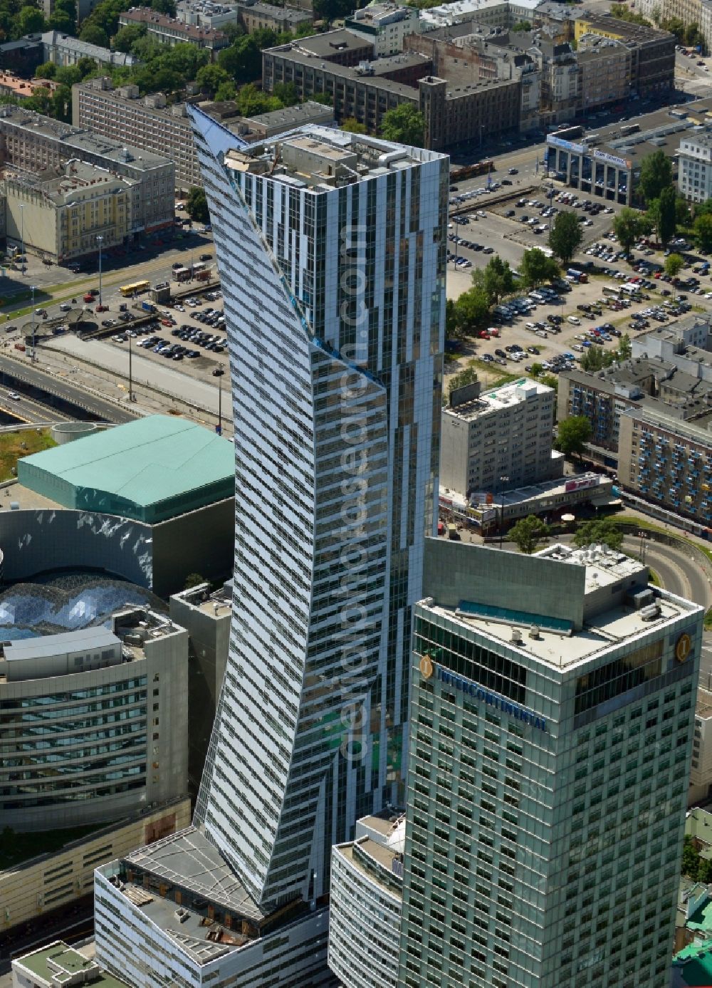 Aerial photograph Warschau - High-rise building Zlota 44 in the city center of the skyline of Warsaw in Poland. The skyscraper was designed by Daniel Libeskind by ORCO PROPERTY GROUP, and serves as a residential and commercial construction with apartments in the center of the capital