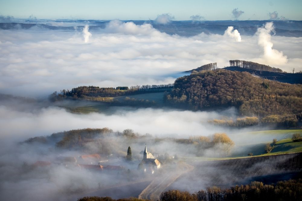 Aerial photograph Arnsberg - Layer of fog and cloud over the building complex of the Oelinghausen monastery in the district of Holzen in Arnsberg in the state of North Rhine-Westphalia