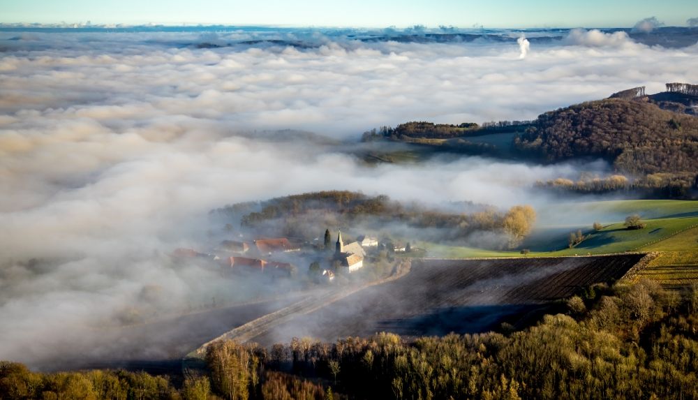 Aerial image Arnsberg - Layer of fog and cloud over the building complex of the Oelinghausen monastery in the district of Holzen in Arnsberg in the state of North Rhine-Westphalia
