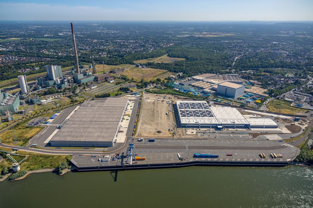 Duisburg from the bird's eye view: High-bay warehouse building complex and logistics center on the premises of logport VI on Rheinstrasse - Faehrstrasse in the district Alt-Walsum in Duisburg at Ruhrgebiet in the state North Rhine-Westphalia, Germany