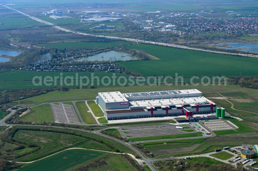 Aerial image Magdeburg - High-bay warehouse building complex and logistics center on the premises von REWE on street Burger Strasse in the district Gewerbegebiet Nord in Magdeburg in the state Saxony-Anhalt, Germany
