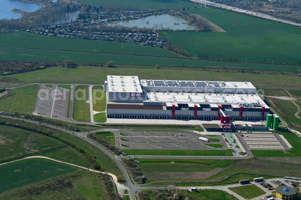 Aerial photograph Magdeburg - High-bay warehouse building complex and logistics center on the premises von REWE on street Burger Strasse in the district Gewerbegebiet Nord in Magdeburg in the state Saxony-Anhalt, Germany
