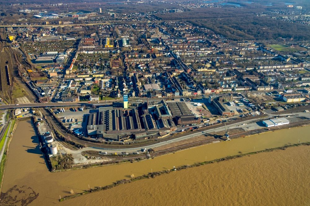 Duisburg from the bird's eye view: High-bay warehouse building complex and logistics center on the premises on Wanheimer Strasse along the Rhein in the district Wanheimerort in Duisburg in the state North Rhine-Westphalia, Germany