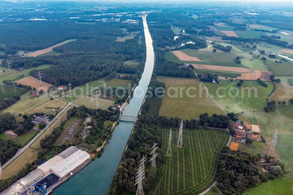 Marl from the bird's eye view: High voltage power lines crossing the channel flow and river banks of the waterway shipping Wesel-Datteln-channel in Marl in the state North Rhine-Westphalia, Germany