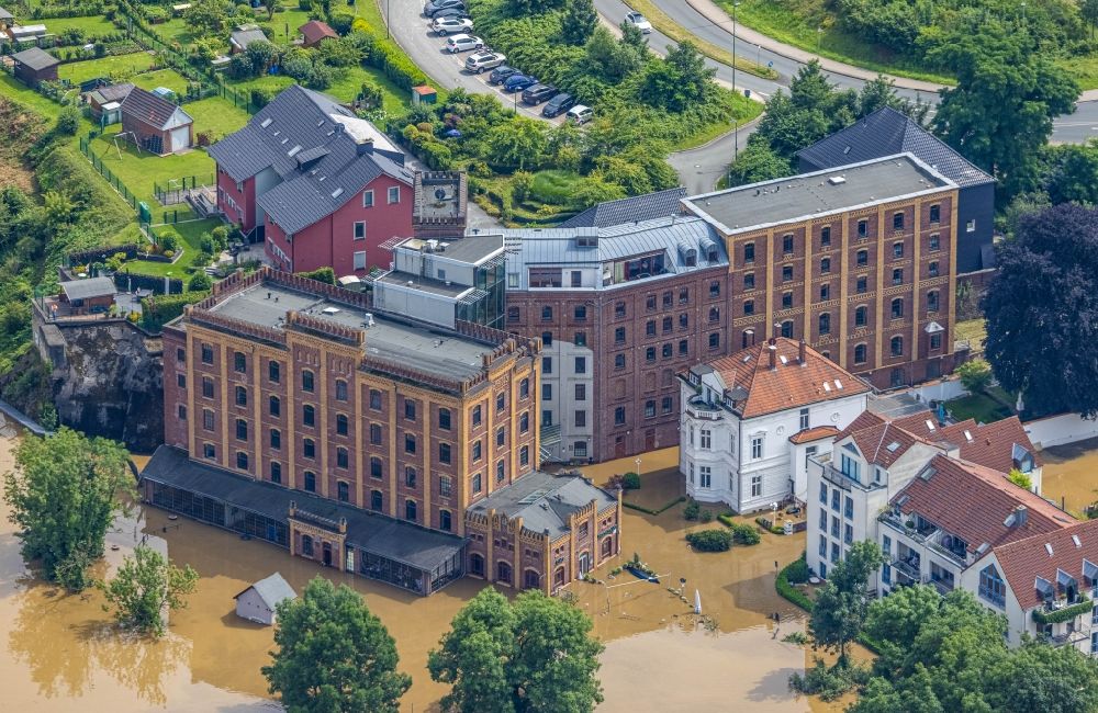 Hattingen from above - Flooding Complex of the hotel building of Hotel Birsche-Muehle on Schleusenstrasse in Hattingen at Ruhrgebiet in the state North Rhine-Westphalia, Germany
