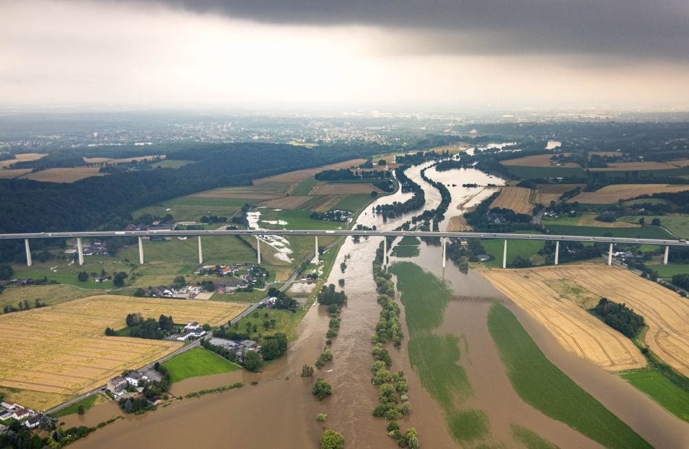 Aerial image Mintard - Flooded Routing and traffic lanes over the highway bridge in the motorway A 52 over the shore of river Ruhr in Muelheim on the Ruhr in the state North Rhine-Westphalia, Germany