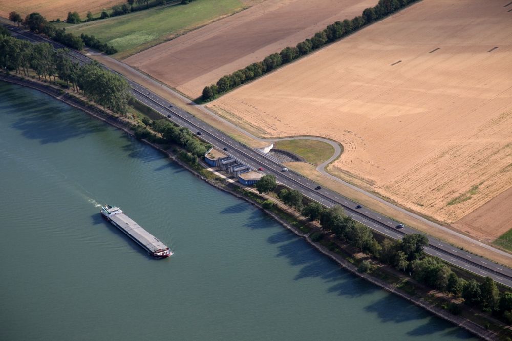 Aerial image Mainz - Flood - retention basin - protective dam construction in Mainz in the state Rhineland-Palatinate, Germany. Inlet and outlet structure of a retention basin for flood protection on the Rhine near Mainz Laubenheim