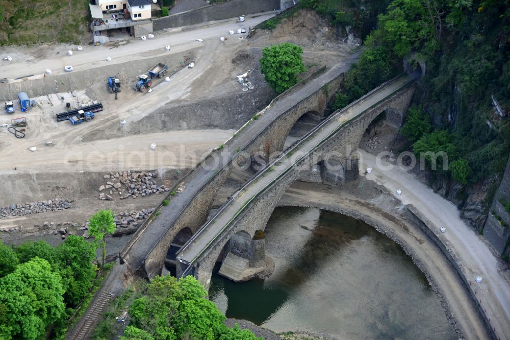 Altenahr from the bird's eye view: Flood damage and reconstruction construction sites in the floodplain of Ahr on street Tunnelstrasse in Altenahr in the state Rhineland-Palatinate, Germany