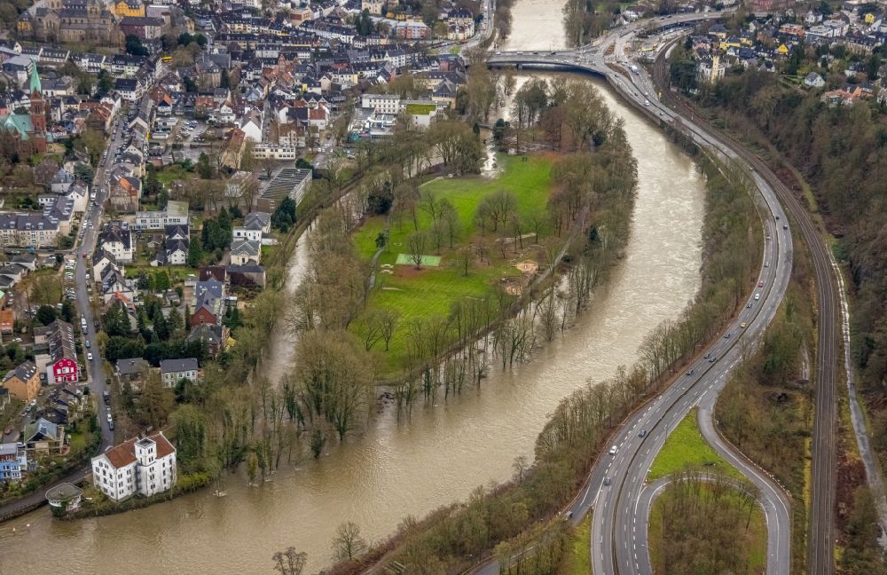 Aerial photograph Essen - Flood situation and flooding, all-rousing and infrastructure-destroying masses of brown water on the banks of the Ruhr in the district Werden in Essen at Ruhrgebiet in the state North Rhine-Westphalia, Germany