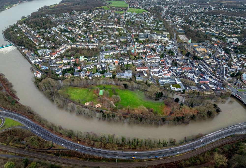 Essen from the bird's eye view: Flood situation and flooding, all-rousing and infrastructure-destroying masses of brown water on the banks of the Ruhr in the district Werden in Essen at Ruhrgebiet in the state North Rhine-Westphalia, Germany