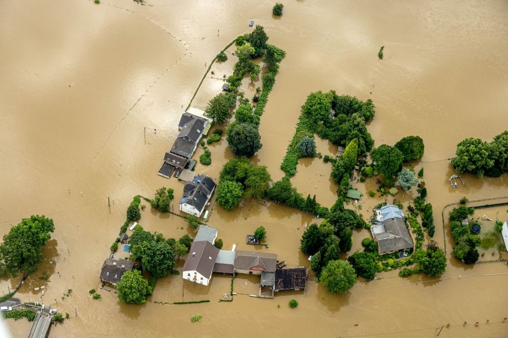 Aerial photograph Bochum - Flood situation and flooding, all-rousing and infrastructure-destroying masses of brown water along the Ruhr in the district Dahlhausen in Bochum at Ruhrgebiet in the state North Rhine-Westphalia, Germany