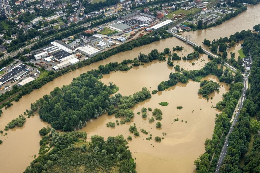 Essen from above - Flood situation and flooding, all-rousing and infrastructure-destroying masses of brown water along the Ruhr in the district Heisingen in Essen at Ruhrgebiet in the state North Rhine-Westphalia, Germany