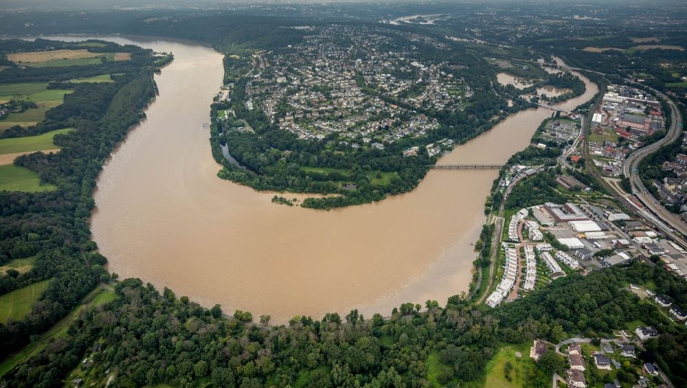 Aerial image Essen - Flood situation and flooding, all-rousing and infrastructure-destroying masses of brown water along the Ruhr in the district Heisingen in Essen at Ruhrgebiet in the state North Rhine-Westphalia, Germany