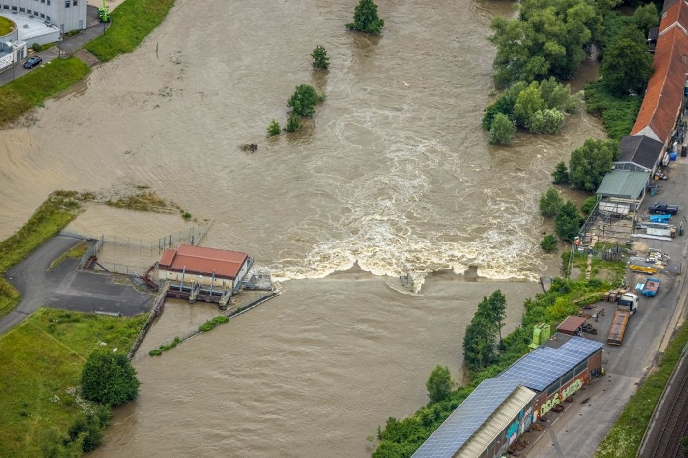 Aerial image Langschede - Flood situation and flooding, all-rousing and infrastructure-destroying masses of brown water along the Ruhr in Langschede in the state North Rhine-Westphalia, Germany