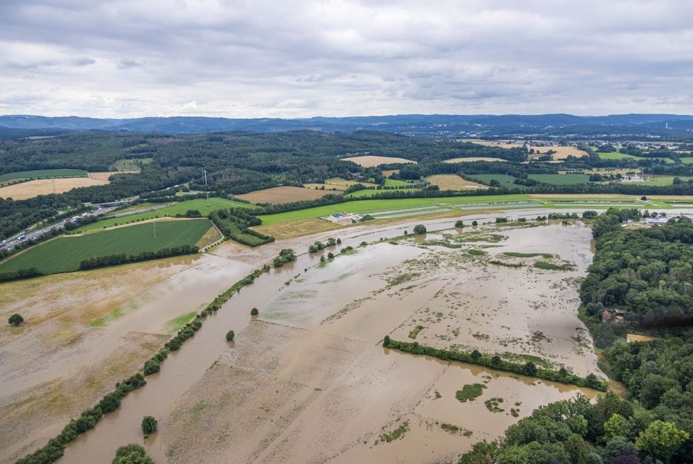 Schwerte from above - Flood situation and flooding, all-rousing and infrastructure-destroying masses of brown water along the Ruhr in Schwerte in the state North Rhine-Westphalia, Germany