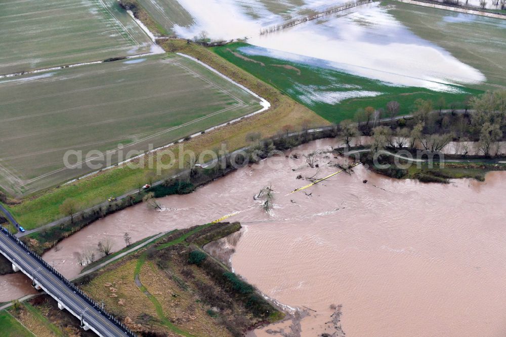 Northeim from the bird's eye view: Flood situation and flooding, all-rousing and infrastructure-destroying masses of brown water in Northeim in the state Lower Saxony, Germany