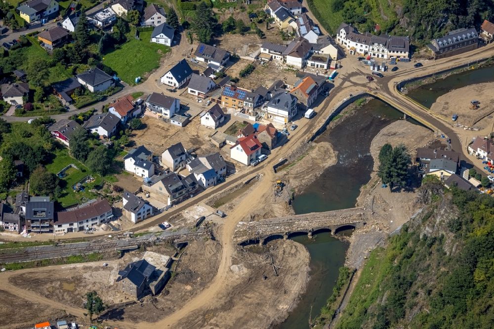 Altenahr from the bird's eye view: Flood damage and reconstruction construction sites in the floodplain on shore of Ahr in Altenahr in the state Rhineland-Palatinate, Germany